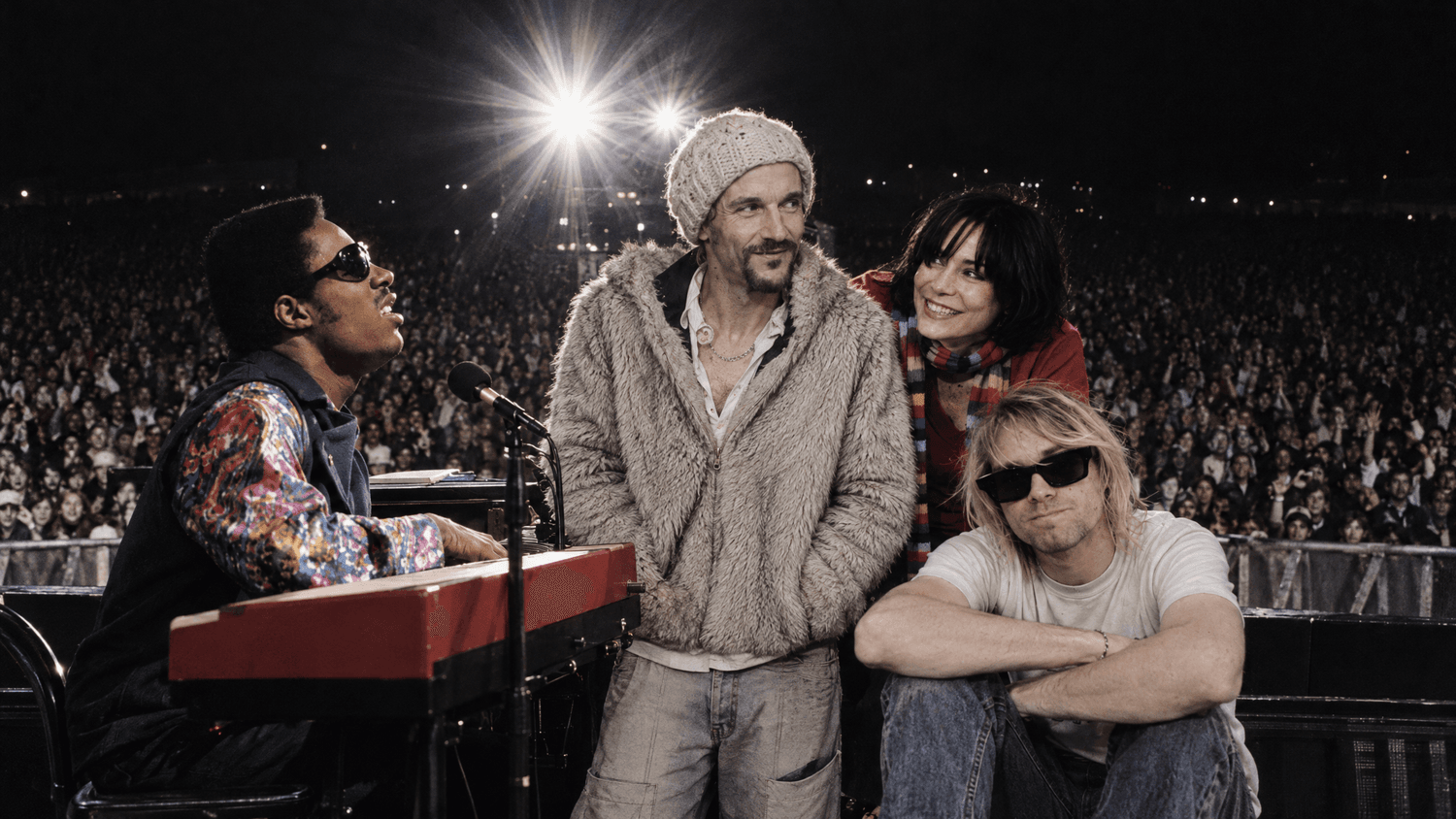 Group portrait of this week's artists: James, Stevie Wonder, Nirvana, Sing Sing
