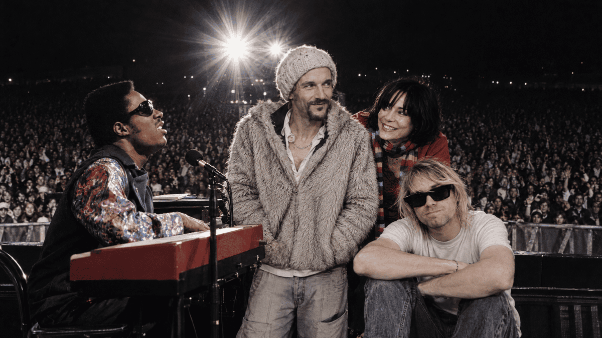 Group portrait of this week's artists: James, Stevie Wonder, Nirvana, Sing Sing